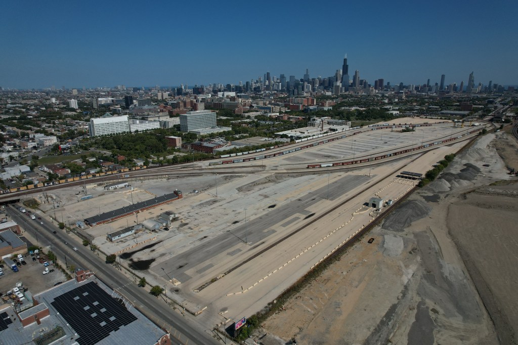 4K aerial photograph of a Chicago-area property showing the full lot, surrounding streets, and landscape from above